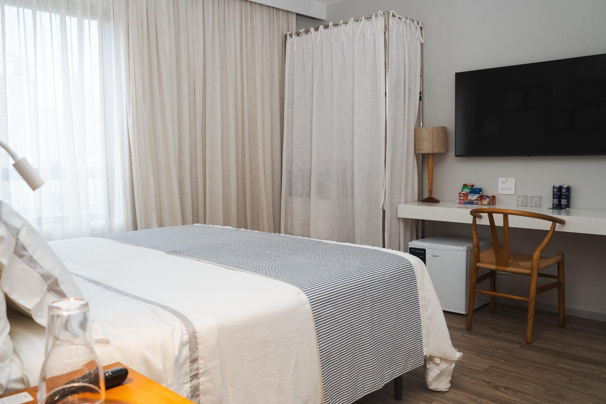 Radisson Rio De Janeiro Barra Otel Oda fotoğraf A room at the hotel
